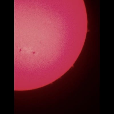 Sunspots and prominences by Brian Sudol. Settings: Taken through solar telescope