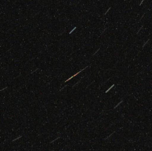 Photo showing a small meteor