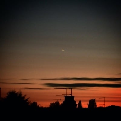 Venus and Jupiter at sunset by Carol Wright. Settings: 
